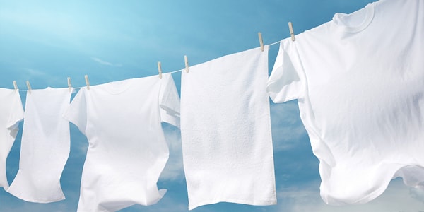 ازالة البقع من الملابس بعد الغسيل